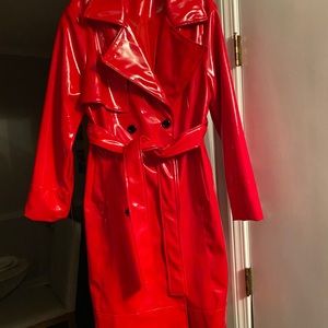 Red patent leather rain trench coat.